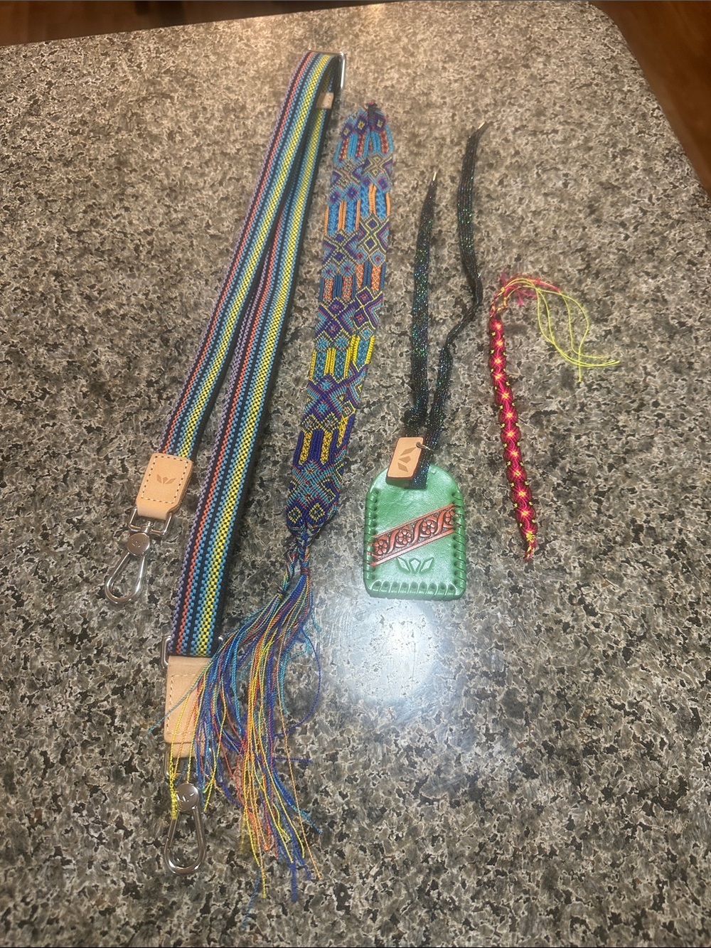 Consuela purse strap with the charms shown. New